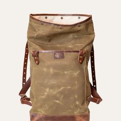 What you'll love about it: Just like a century ago, you needed simply one pack to last you a lifetime, because they were just made that good. This rugged pack is inspired by the early designs of the backpack during the 1920s. Made for outdoor adventures, city exploring, and built to last a lifetime. This bag will age and build even more character the more you use it. So, don't be afraid to adventure more with grit and spirit. How to Style: The 1920 Backpack goes with everything, especially warm Vintage Waxed Canvas Backpack For Everyday, Vintage Waxed Canvas Everyday Backpack, Vintage Everyday Backpack In Waxed Canvas, Vintage Everyday Waxed Canvas Backpack, Vintage Waxed Leather Backpack, Rugged Outdoor Backpack With Waxed Finish, Vintage Canvas Backpack For Outdoor Activities, Rugged Leather-backed Backpack For Adventure, Rugged Outdoor Leather Backpack With Waxed Finish