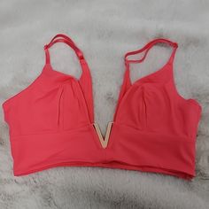 Nwt Victoria's Secret Pink Sleeping Bra In Size M. Absolutely Gorgeous Sleep Wear, The Fabric Feels Amazing With A Beautiful Gold In Color V Shape Hardware In The Middle. Non Padded. Add This Piece To Your Sleep Wardrobe. If You Have Any Questions, Please Reach Out To Me. Any Reasonable Offers I Am Willing To Do Or If Interested In More Than One Item In My Closet Do A Bundle Which Includes A Discount. Anything $15 And Below Is A Set Price. Smoke And Pet Free Home. All Sales Are Final! Victoria's Secret V-neck Top For Party, Victoria's Secret V-neck Party Top, Sleeping Bra, Balconet Bra, High Neck Bra, Sleep Bra, Bralette Crop Top, Sleep Wear, New Bra