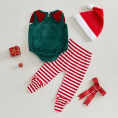 Includes: Romper, Pants, & Hat Material: Polyester Gender: Boys & Girls Pattern: Stripes Sleeve Length: Sleeveless Summary: Baby Toddler Sleeveless Elf Romper with Striped Footie Pants & Hat 3 Piece Christmas Outfit Playful Sleeveless Bottoms For Playtime, Elf Outfit, Baby Boy Christmas, Elf Clothes, Christmas Clothes, Boys Christmas, Striped Sleeve, Outfits With Hats, Girl Pattern