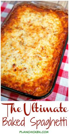 a cheesy casserole dish with cheese and herbs in it on a checkered table cloth