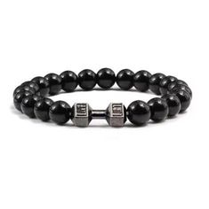 -This striking accessory features high-quality Black Onyx beads, exuding a rich, deep black hue that evokes a sense of power, sophistication, and confidence. -As a powerful grounding stone, it promotes emotional stability, mental clarity, and focus, while protecting negative energies and psychic attacks. -Black Onyx is also believed to enhance inner strength, resilience, and self-discipline, empowering you to face life's challenges with courage and grace. -Embrace the potent energy and captivating elegance of the Black Onyx Bracelet, and experience the enhanced protection, inner strength, and confidence it brings to your life. -Benefits: Offers mental clarity and decisiveness in decision-making processes. Shields against negative energies, psychic attacks, and harmful influences. Enhances Black Spiritual Bracelets For Party, Adjustable Black Jewelry With 8mm Beads, Elegant Black Beaded Bracelets With 8mm Beads, Black Round Beads Bracelets For Party, Black Hand-strung Jewelry Bracelet, Elegant Black Wristband Gift, Spiritual Black Beads Bracelet, Spiritual Black Beaded Bracelets, Adjustable Black Wristband With 8mm Beads