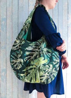 Beautiful handmade green leaves print hobo style bag for summer. Tropical beach bag, also can be used as a large shopping bag, market bag or purse. Fabric bag made from home decor fabric, very durable and long lasting tote bag. This hobo bag is handmade. I use only careful tested fabrics, so it would last for long time. The bag is one double sided, can be used from both sides (reversible), one side green leaves patterns print, other green cotton/polyester home decor fabric. About bag: Dimensions Green Cotton Hobo Bag For Travel, Bohemian Green Shoulder Bag For Everyday, Bohemian Green Beach Bag For Everyday Use, Green Cotton Hobo Bag For Daily Use, Handmade Green Hobo Bag For Daily Use, Summer Green Large Capacity Hobo Bag, Tropical Summer Tote Shoulder Bag, Green Bohemian Tote Bag, Bohemian Green Tote Bag