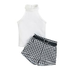 Elevate your little one's summer style with our charming High Neck Sleeveless Top and Plaid Shorts Set – a perfect blend of fashion and comfort! The high neck sleeveless top, in its elegant design, offers a touch of sophistication while keeping your child cool on warm summer days. The sleeveless cut allows for easy movement, while the high neckline adds a trendy twist to this classic look. Paired with the top are matching plaid shorts that effortlessly capture a playful and stylish vibe. The pla Toddler Girl Summer Outfits, Outfits Sleeveless, Toddler Girl Outfits Summer, High Neck Sleeveless Top, Toddler Girl Summer, High Neck Sleeveless, Halter Tops, Girls Summer Outfits, Clothes Set