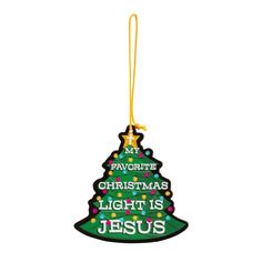 a christmas tree ornament hanging from a yellow ribbon with the words, my favorite christmas light is jesus