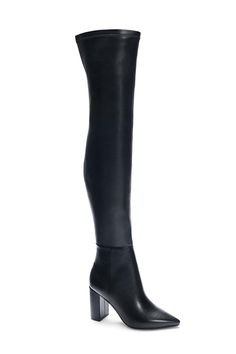 a pair of black leather boots with high heel and pointed toe, on white background