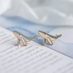 This Stud Earrings item by MissModiDesign has 720 favorites from Etsy shoppers. Ships from Denton, TX. Listed on Jan 16, 2023 Cool Metal Jewelry, Whale Earrings, Enameling Jewelry, Sea Of Love, Fantasy Earrings, Snake Jewelry, Snake Earrings, Steel Post, Trendy Earrings