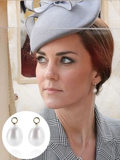 the queen of england wearing a grey hat