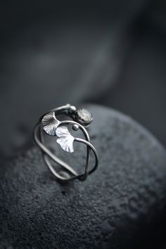 ITEM DESCRIPTION: This ring can be adjustable 5 - 6 (US and Canada) J 1/2 - M (UK and AU) Weight - 2 g. I made this plant ring of sterling silver and rainbow moonstone. It's so delicate and dainty! Two tiny ginkgo leaves look very elegant. Silver leaf ring will be a great addition to your jewelry collection or the present for someone whom you love. I can make this ring with various stones - just write to me to discuss the details. I'm always open to custom orders. This handmade ring will come to Elegant Adjustable Leaf-shaped Jewelry, Silver Leaf-shaped Adjustable Jewelry, Unique Nickel-free Leaf-shaped Jewelry, Silver Leaf Ring As Gift, Silver Leaf-shaped Ring As Gift, Silver Leaf Ring Gift, Minimalist Sterling Silver Leaf Jewelry, Nature-inspired Adjustable Flower Ring For Anniversary, Minimalist Leaf-shaped Sterling Silver Jewelry