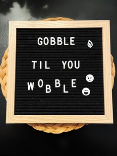 a sign that says gobble til you wobble