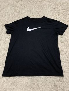 Youth Large V Neck Nike Short Sleeve Shirt. Nike Casual Short Sleeve Shirt, Casual Nike Short Sleeve Tops, Nike Casual Crew Neck Shirt, Casual Nike Crew Neck Shirt, Nike Short Sleeve Shirt For Summer, Nike Short Sleeve Summer Shirt, Nike Sporty Shirt For Spring, Nike Sporty Spring Shirt, Nike Graphic Tee For Summer