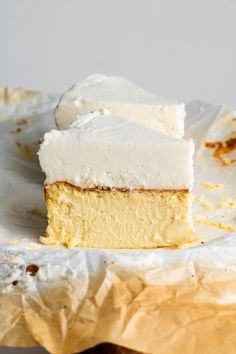 two pieces of cake sitting on top of a paper plate