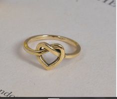 "Heart ring, Handmade Ring, Promise ring,14k Gold filled Ring, Brass ring, Dainty ring, Gift For Her, Midi Ring, Stacking Ring, heart ring Material :- Brass, Silver, Gold, Rose Gold Plated ❥ Add this beautiful one little thing of galactic shine to make you feel unique and to transform your lives. Perfect for any kind of outfit and every occasion. ❥ Customers satisfaction is our biggest priority, please contact us with any questions/queries for future or existing orders, and we will do our best to make sure you are happy with your order. ❥Please make sure to add the correct address during check out. You can return your purchased item within 15 days after successful delivery. We offer a 100% \"Money Back Guarantee\" if you are not satisfied with your purchase. Return charges will be paid by Handmade Gold Heart Ring For Promise, Handmade Gold Ring For Valentine's Day, Handmade Open Heart Ring For Wedding, Adjustable Handmade Gold Heart Ring, Handmade Adjustable Elegant Heart Ring, Elegant Handmade Adjustable Heart Ring, Midi Rings Gold, Gold Moonstone Ring, Nature Inspired Rings