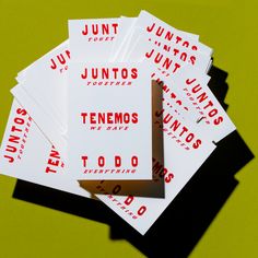 five unopened tennis cards sitting on top of each other in front of a green background