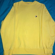 Vintage Tommy Hilfiger Sweater Crewneck Size Small Unisex Great Condition No Tags 90s Vintage Tommy Hilfiger Long Sleeve Streetwear Tops, Yellow Winter Sweater For Streetwear, Yellow Long Sleeve Sweater For Streetwear, Yellow Crew Neck Sweatshirt For Fall, Yellow Casual Sweatshirt For Spring, Casual Yellow Sweatshirt For Spring, Tommy Hilfiger Crew Neck Sweatshirt For Streetwear, Retro Yellow Sweatshirt For Winter, Trendy Yellow Crew Neck Sweatshirt