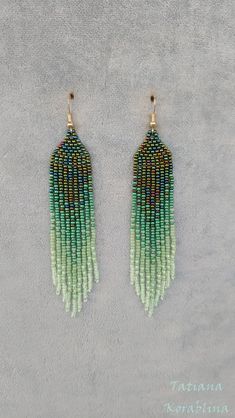 These handmade earrings are made of high-quality Czech beads and strong synthetic thread. They are elegant, fashionable, and highly versatile, suitable for everyday wear. Color: green,mint ,herbal. There may be some color discrepancies which is due to the different monitor settings 100% hand made with love! Measurements: Length-about  11.5cm (4.33 inch) Width -about  2 cm (0.79 inch) Materials: Sterling silver components Czech glass beads Strong bead weaving thread Green Beaded Drop Earrings For Summer, Green Dangle Tassel Earrings For Summer, Green Tassel Drop Earrings As Gift, Green Fringe Earrings For Summer, Green Tassel Jewelry For Summer, Summer Green Tassel Jewelry, Handmade Green Beaded Dangle Earrings, Handmade Green Dangle Beaded Earrings, Green Tassel Drop Earrings