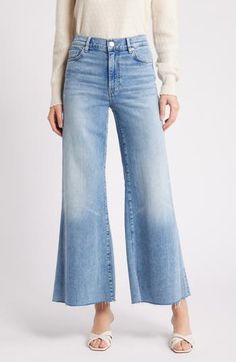 Made from superstretchy denim, these '70s-inspired palazzo jeans are remade for today with chewed hems and a slightly shorter inseam. 28 1/2" inseam; 28" leg opening; 11" front rise; 15" back rise (size 29) 77% cotton, 18% modal, 4% elasterell-p, 1% elastane Machine wash, tumble dry Made in Turkey Summer Wide-leg Flares With Frayed Hem, Light Wash Wide Leg Flares For Spring, Fall Wide Leg Flares With Frayed Hem, Fall Wide-leg Flares With Frayed Hem, Spring Medium Wash Wide Leg Flares, Denim Blue Wide Leg Flares For Fall, Wide Leg Denim Blue Flares For Fall, Fall Denim Blue Wide Leg Flares, Crop Wide Leg Jeans