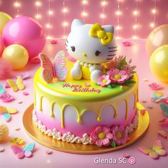 a hello kitty birthday cake with flowers and butterflies on it, surrounded by balloons and streamers