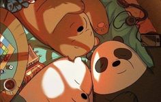 two cartoon bears laying next to each other on top of a bed in front of a mirror