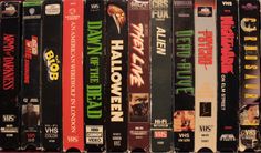 a row of vhs movies sitting on top of each other