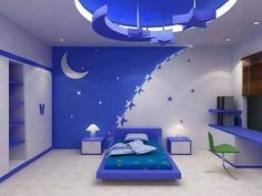 a bedroom with blue and white walls, stars on the ceiling and a bed in the middle