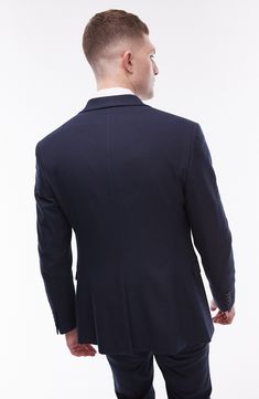 A lightly textured weave distinguishes this suit jacket tailored in a smart skinny fit and framed with handsome notched lapels. 30" length (size 42R) Notched lapels Chest welt pocket; front flap pockets Nonfunctional four-button cuffs Lined 64% polyester, 34% viscose, 2% elastane Dry clean Imported Tailored Sport Coat For Business Casual, Slim Fit Blazer With Lapel Collar For Business Casual, Slim Fit Single Breasted Blazer For Business Casual, Slim Fit Business Casual Suit With Hidden Buttons, Single Breasted Slim Fit Blazer For Business Casual, Office Double Breasted Suit With Notch Lapel, Business Casual Slim Fit Blazer With Lapel Collar, Business Casual Slim Fit Single Breasted Blazer, Fitted Tweed Jacket With Suit Collar For Formal Occasions