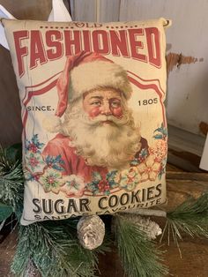 an old fashioned pillow with a santa clause on it