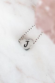 Discover our exquisite collection featuring custom stainless steel mini heart necklace with personalized initial, perfect for creating a unique and meaningful custom gift.  Minimalist delicate customized gift for mom, best friend, or special someone.   How to Order: ❣️ 1.  Choose Silver or Gold 2.  Choose Custom Engraving or NO Engraving 3.  Add to Cart 4.  Add Initial Desired and Font Choice to Personalization Box or N/A if not applicable 5.  Check out Material: 🌿 Waterproof, non-tarnish, hypo Dainty Hand Stamped Necklaces For Personalized Gift, Dainty Hand Stamped Necklace For Personalized Gift, Personalized Stainless Steel Heart Pendant Jewelry, Dainty Stainless Steel Jewelry For Valentine's Day, Personalized Stainless Steel Jewelry As Gift For Her, Personalized Stainless Steel Heart Pendant, Minimalist Stainless Steel Jewelry For Mother's Day, Stainless Steel Heart Charm Jewelry As Gift For Her, Dainty Stainless Steel Heart Charm Jewelry