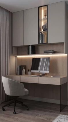 an office with a desk, chair and bookshelf in the middle of it