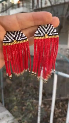 Traditional Fringe Beaded Drop Earrings, Traditional Beaded Fringe Chandelier Earrings, Traditional Fringe Drop Earrings, Traditional Fringed Beaded Earrings, Traditional Fringe Dangle Jewelry, Traditional Beaded Earrings With Tassels, Traditional Fringe Beaded Earrings With Round Beads, Traditional Beaded Earrings With Fringe And Round Beads, Traditional Red Beaded Tassel Earrings