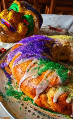 there is a mardi gras pastry on the plate