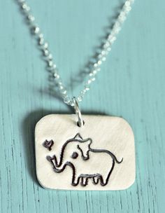 Silver Elephant Necklace by Susie Ghahremani / boygirlparty.com Teen Jewelry Trends, Elephant Jewelry, Silver Elephant, Jewelry Illustration, Silver Elephants, Elephant Necklace, Elephant Love, Silver Cat, Original Jewelry