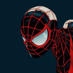 a spider - man in black and red clothes with his hands on his hips