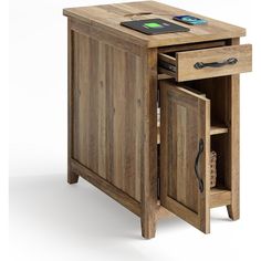 a wooden cabinet with an open drawer and cell phone on it's side shelf