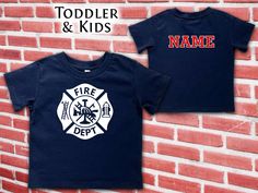 Our personalized Firefighter cotton tee will delight any youngster with their name proudly displayed on the back of the shirt. Choose from a large red or white Maltese Cross on the front. This custom shirt is the perfect gift for birthday or Christmas and a big hit for dress up too.  Measure before you purchase to ensure that your shirt will fit. Shirts can not be returned or exchanged if you order the wrong size. Rabbit Skins STYLE #3321 TODDLER FINE JERSEY TEE 4.5 oz. 100% combed ringspun cott Red Short Sleeve T-shirt With Name Print, Customizable School Spirit Red T-shirt, Red Team Spirit T-shirt With Name Print, White Maltese, Maltese Cross, Custom Shirt, Gift For Birthday, Jersey Tee, Maltese