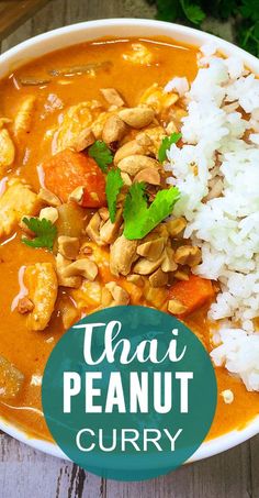 thai peanut curry with rice and chicken in a bowl