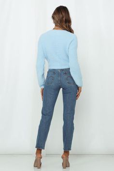 Length: Inside Leg: 70cm; Front Rise: 27cm; Leg Cuff: 34cm (of size W25).  Medium blue wash jeans with whiskering.  Non-lined.  Straight cut; high-rise; snug-through hip and thigh; cropped.  Cold gentle machine wash. Model is a standard XS and is wearing size 25. True to size. Non-stretchy mid-weight woven denim. Belt-loops. Zip fly; button shank. Five-pocket design. Branded copper hardware. Branded leather patch pocket to rear. 99% Cotton/1% Elastane. Levi Wedgie Straight Fit Jeans are the chee Levi Wedgie, Levis Wedgie Jeans, Wedgie Jeans, Denim Essentials, Transition Outfits, Moustaches, Leg Cuffs, Jive, Straight Fit Jeans