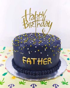 a birthday cake with the words happy birthday on it and gold letters that say father