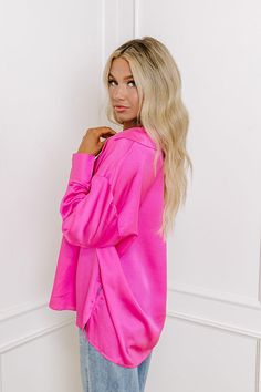 – Simple and stunning for a sweet night out – Lightweight, soft textured material – V-cut, collared neckline – Long, loose sleeves with button closure cuffs – Relaxed, flattering silhouette that ends in a straight upper-thigh hemline Sweet Night, Loose Sleeves, V Cut, V Cuts, Hip Length, Soft Textures, Distressed Jeans, Hot Pink, Night Out