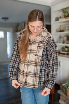 Unleash your boldness with our Bold Contrast Flannel! This oversized plaid top features a drop shoulder design and frayed round hem for a edgy look. With long sleeves and patch pockets, it's both stylish and functional. Perfect for making a statement, button down this flannel and stand out from the crowd. Fits true to size. Model is wearing a size Medium. Oversized Plaid Flannel Shirt With Pockets, Plaid Patchwork Flannel Shirt For Fall, Patchwork Long Sleeve Flannel Shirt, Patchwork Long Sleeve Flannel Shirt For Fall, Oversized Flannel Tops For Fall, Plaid Patchwork Tops For Fall, Fall Flannel Tops With Pockets, Casual Flannel Patchwork Tops For Fall, Oversized Flannel Tops With Pockets