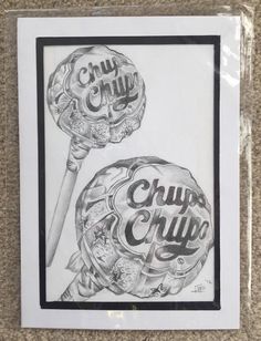 a drawing of two lollipops with the words chup chup on them