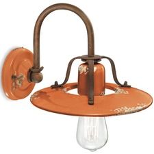 an orange wall light with a metal arm and glass bulb on the side, attached to a white background