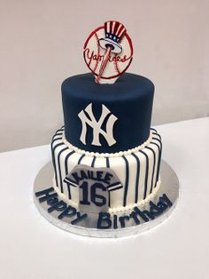 a three tiered birthday cake decorated with the new york yankees logo