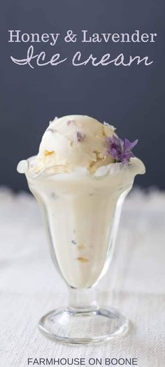 an ice cream sundae in a glass dish with lavender flowers on top and the words honey & lavender lee cream above it