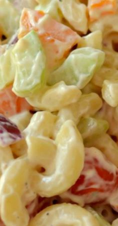 a close up view of macaroni salad with dressing