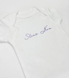 The 'Sleep Now' ONESIES® brand outfit is a play on Taylor Swift's re-recorded album, 'Speak Now (Taylor's Version)'. With the enchanting font in sparkly purple, it's bound to be a favorite among babies and parents! -----Returns----- Please contact me within 14 days of receiving your item if you have any issues. I will be happy to work with you! Requests will only be handled through Etsy. No DMs on social sites will be accepted. Thanks! Taylor Swift Sleep, White Short Sleeve Onesie For Bedtime, White Cotton Bodysuit For Bedtime, Taylor Swift Baby Shower Gift, Fitted White Bodysuit For Sleep, Fitted White Onesie For Bedtime, Taylor Swift Baby Onesie, Branded Outfits, Taylor Swift Outfits