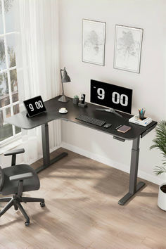 a computer desk with a clock on it and a chair in front of the desk