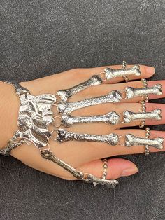 Material: Alloy(Length: 4.5")Style: PunkElement: Skeleton JointType: Solid Color Occasion: Halloween Skeleton Hand Bracelet, Hand Bracelet With Ring, Skeleton Finger, Skeleton Bracelet, Finger Bracelets, Flexible Bracelet, Bones Bracelet, Prom 2024, Halloween Bracelet