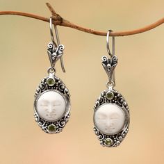 Full of soul two serene faces are hand-carved of bone featured in this pair of dangle earrings from Bali. Buana designs the earrings framing the faces with intricate handcrafted sterling silver motifs. Petite peridot gems complete the earrings. Earring Frame, Face Jewelry, Face Jewellery, Peridot Earrings, Sterling Silver Cuff, Silver Cuff Bracelet, Jewelry Packaging, Necklace Sizes, Silver Cuff