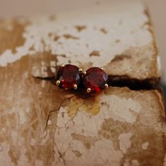 Nakhti Stud Earrings feature richly colored Garnet gemstones | Etsy Pyrope Garnet, 6th Wedding Anniversary, Demantoid Garnet, Spessartite Garnet, Tsavorite Garnet, Hessonite Garnet, Lexington Ky, Gemstone Stud Earrings, Rhodolite Garnet