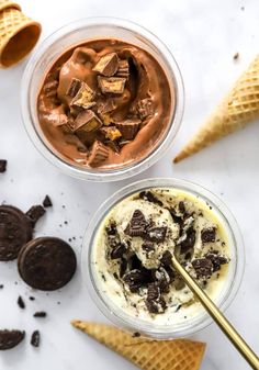 two bowls filled with ice cream and chocolate chips next to an oreo chip cookie